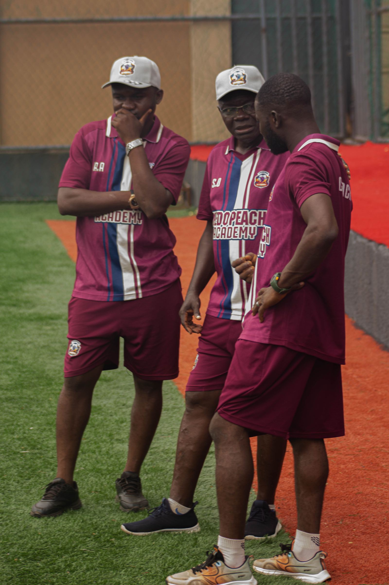KEDOPEACH Academy coaching staff on the pitch
