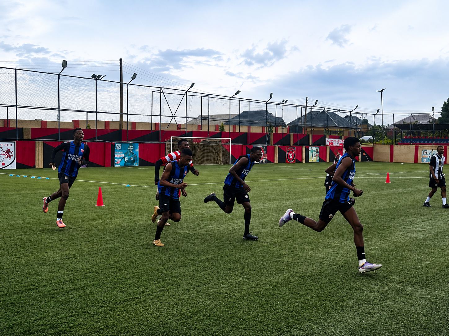 Players sprinting during a conditioning session