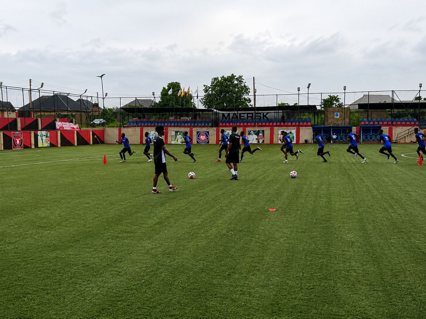 Team running through training drills